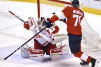 Florida Panthers right wing Patric Hornqvist (70) scores a goal past Detroit Red Wings goaltender Thomas Greiss (29) during the second period of an NHL hockey game Tuesday, Feb. 9, 2021, in Sunrise, Fla. (AP Photo/Jim Rassol)