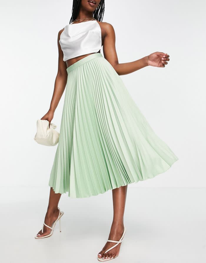 <p><a href="https://go.redirectingat.com?id=74968X1596630&url=https%3A%2F%2Fwww.asos.com%2Fus%2Fcloset-london%2Fcloset-london-pleated-midi-skirt-in-sage%2Fprd%2F202868029&sref=https%3A%2F%2Fwww.cosmopolitan.com%2Fstyle-beauty%2Ffashion%2Fa42858335%2Fnew-york-fashion-week-street-style-fall-2023%2F" rel="nofollow noopener" target="_blank" data-ylk="slk:Shop Now;elm:context_link;itc:0;sec:content-canvas" class="link ">Shop Now</a></p><p>Closet London pleated midi skirt in sage</p><p>$52.80</p><p>us.asos.com</p>