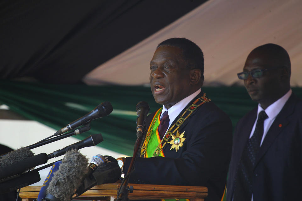 Zimbabwean President Emmerson Mnangagwa addresses people during a Heroes' Day event to commemorate the lives of those who died in the southern African country's 1970s war against white minority rule, in Harare, Monday, Aug. 13, 2018. Zimbabwe's president has called on the troubled country to unite and "put the election period behind us and embrace the future" in his first public address since winning disputed elections. (AP Photo/Tsvangirayi Mukwazhi)