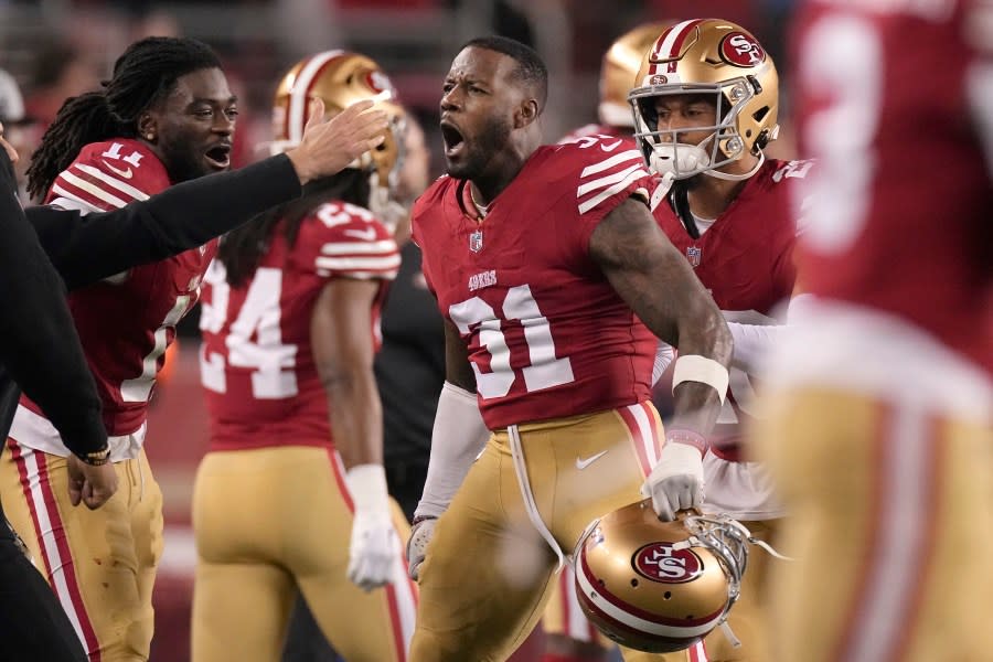 San Francisco 49ers wide receiver Brandon Aiyuk, left, and safety Tashaun Gipson Sr. (31) celebrate during the second half of the NFC Championship NFL football game against the Detroit Lions in Santa Clara, Calif., Sunday, Jan. 28, 2024. (AP Photo/Mark J. Terrill)