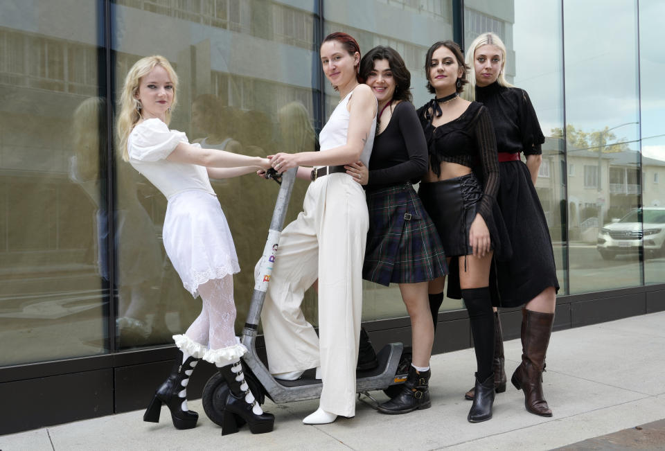 Emily Roberts, from left, Lizzie Mayland, Abigail Morris, Aurora Nishevci and Georgia Davies of the indie rock band The Last Dinner Party pose for a portrait, Tuesday, Nov. 7, 2023, in Los Angeles. (AP Photo/Chris Pizzello)