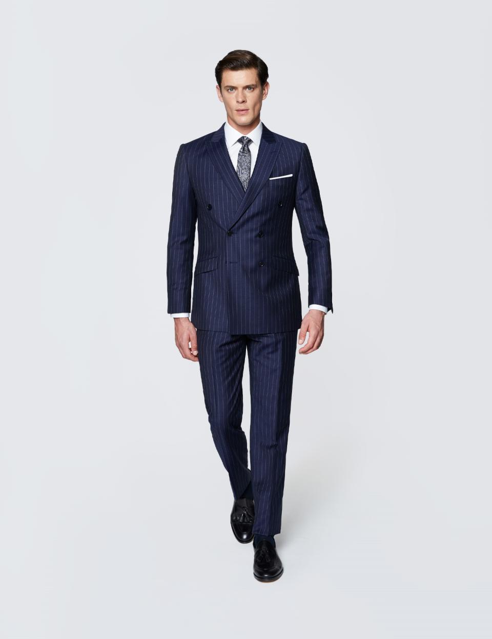 <p><a href="https://go.redirectingat.com?id=74968X1596630&url=https%3A%2F%2Fwww.hawesandcurtis.com%2Fnavy-chalk-stripe-double-breasted-slim-fit-suit-jksrus33-g01v%3Fshoppingcampaignid%3D1%26gclid%3DCj0KCQjwi7GnBhDXARIsAFLvH4ls8e7o_oB3fgETQXq-1gGk0OFal0FsuaQ6k2ghGuRVIB2eAiEoHPsaAgNLEALw_wcB&sref=https%3A%2F%2Fwww.esquire.com%2Fstyle%2Fmens-fashion%2Fg19851288%2Fwedding-dress-code-guide-men%2F" rel="nofollow noopener" target="_blank" data-ylk="slk:Shop Now;elm:context_link;itc:0;sec:content-canvas" class="link ">Shop Now</a></p><p>Chalk Stripe Double Breasted Slim Suit</p><p>hawesandcurtis.com</p><p>$549.00</p>