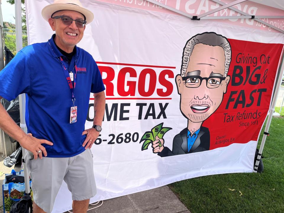 Al Burgos, owner of Burgos Income Tax in Rochester, is director of the annual Domino Tournament at the Puerto Rican Festival.