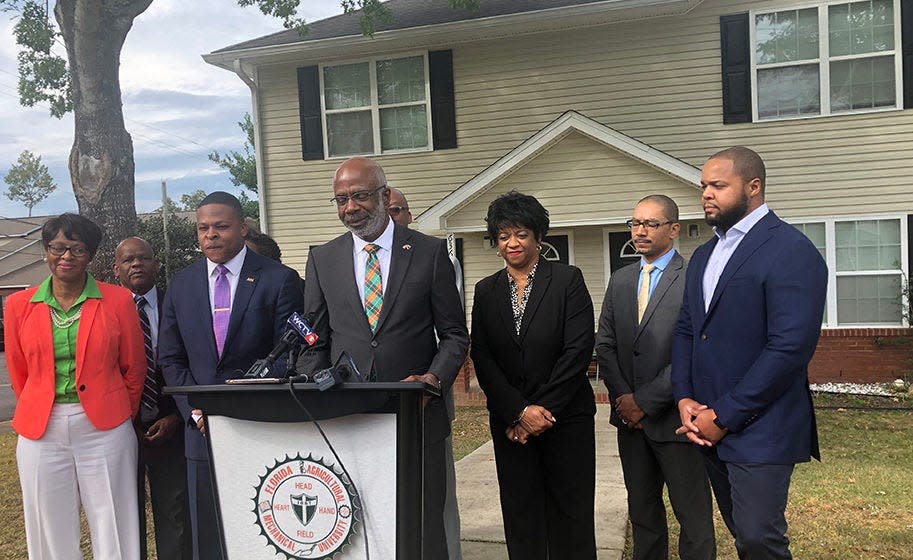 FAMU President Larry Robinson announces the closing of property that will add 118 beds to the university’s housing while standing in front of Lighthouse at Brooklyn Yard on Oct. 17, 2022.