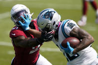 Carolina Panthers wide receiver D.J. Moore pushes way Arizona Cardinals cornerback Patrick Peterson during the first half of an NFL football game Sunday, Oct. 4, 2020, in Charlotte, N.C. (AP Photo/Brian Blanco)
