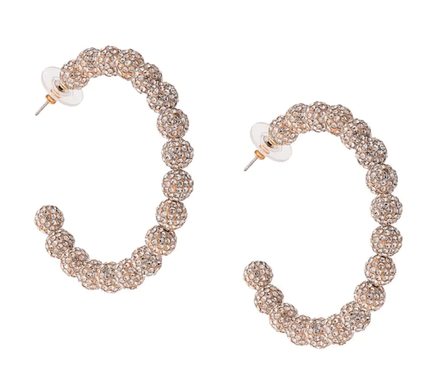 <p>Lele Sadoughi Slim Stardust Hoop Earrings, $245, <a href="https://rstyle.me/+Dsq-eLklTRSmyqnM1OAYHg" rel="nofollow noopener" target="_blank" data-ylk="slk:available here;elm:context_link;itc:0;sec:content-canvas" class="link ">available here</a>.</p>