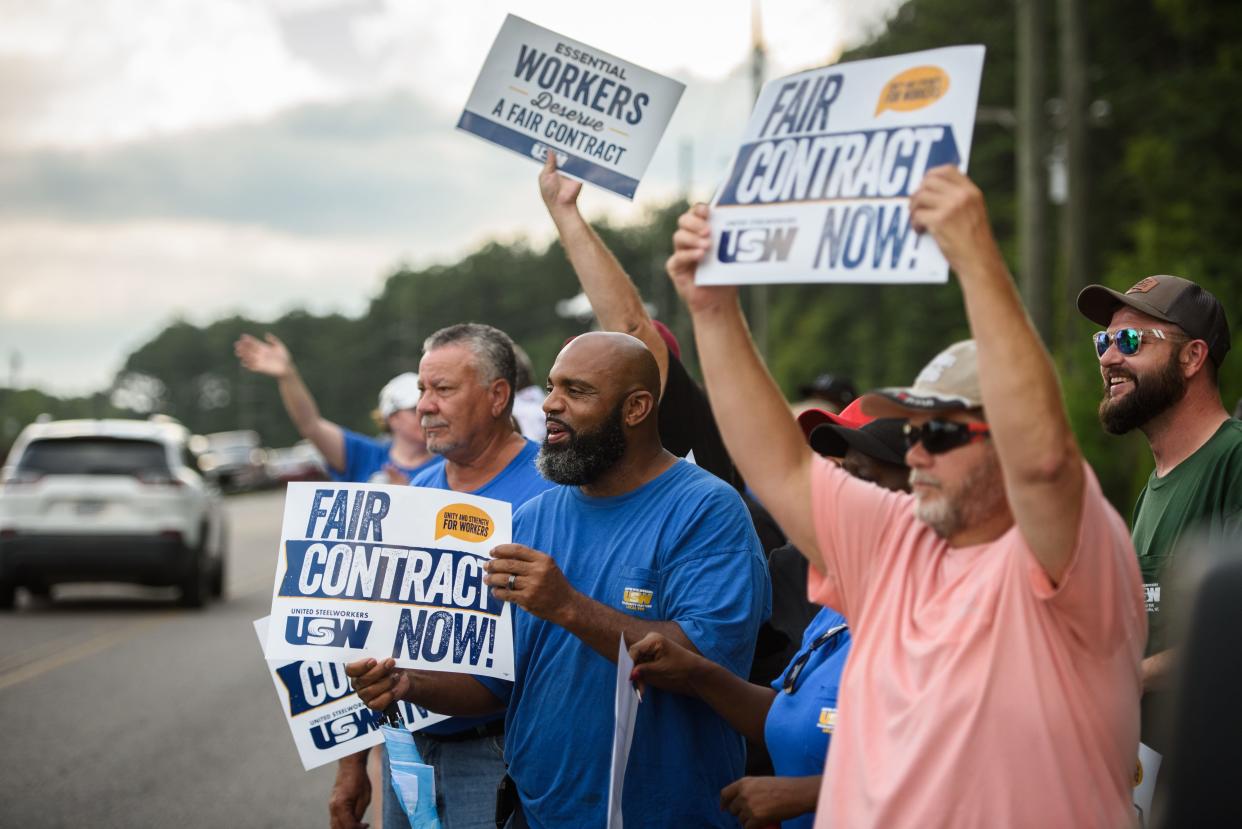People picket outside the Goodyear Tire and Rubber Plant in Fayetteville on Friday, July 29, 2022.