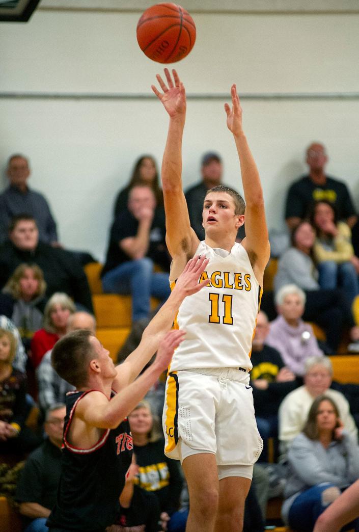 Colonel Crawford&#39;s Carter Valentine shoots from the 3-point line.