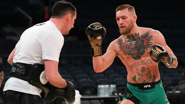 McGregor with his boxing coach. Image: Getty