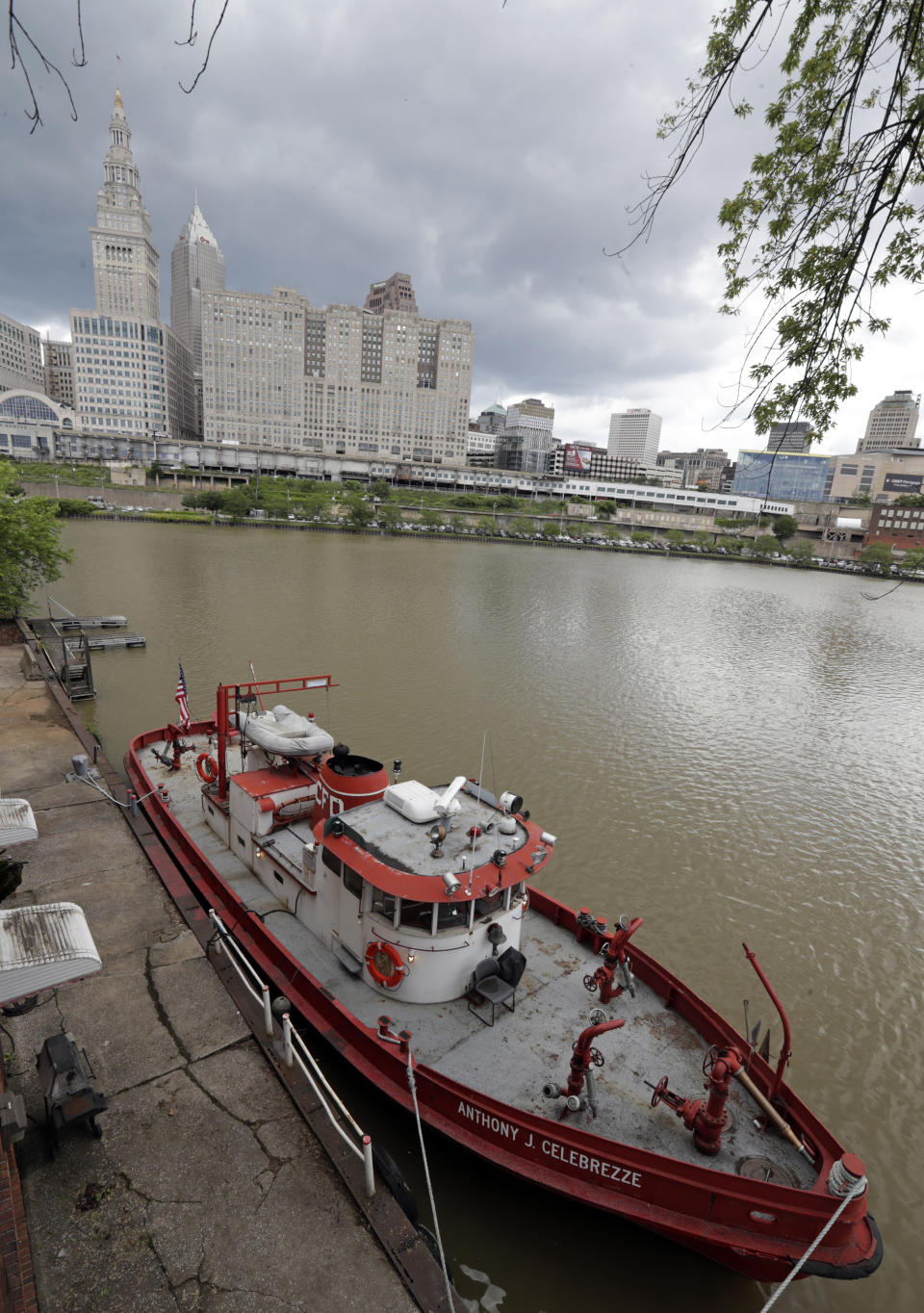 The Anthony J. Celebrezze rests on the Cuyahoga River, Thursday, June 13, 2019, in Cleveland. The fire boat extinguished hot spots on a railroad bridge torched by burning fluids and debris on the Cuyahoga River in 1969. (AP Photo/Tony Dejak)