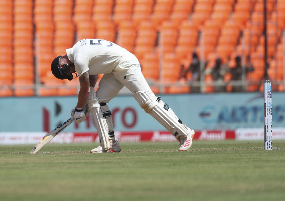 England's Ben Stokes reacts after being dismissed by India's Washington Sundar during the first day of fourth cricket test match between India and England at Narendra Modi Stadium in Ahmedabad, India, Thursday, March 4, 2021. (AP Photo/Aijaz Rahi)