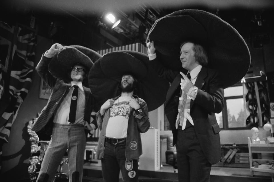 Comedians (L-R) Graeme Garden, Bill Oddie and Tim Brooke-Taylor in the 'Ecky Thump' sketch from episode 'Kung Fu Kapers' of the BBC television series 'The Goodies', March 21st 1975. (Photo by Don Smith/Radio Times via Getty Images)