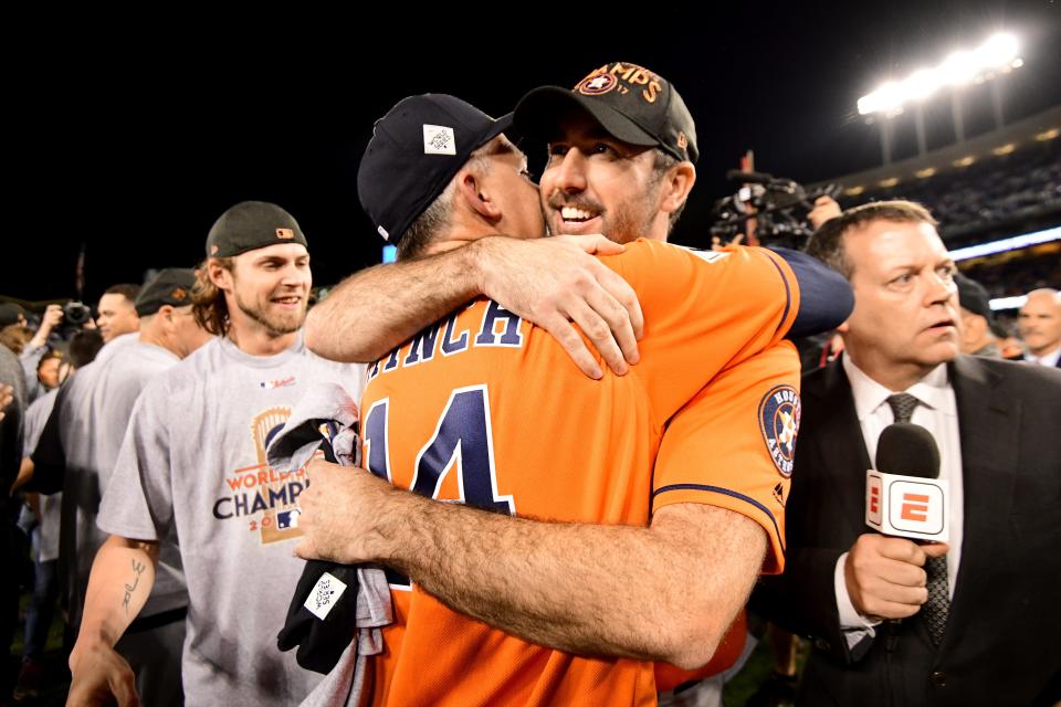 Justin Verlander of the Houston Astros celebrates with manager A.J. Hinch after defeating the Los Angeles Dodgers 5-1 in Game 7 to win the World Series at Dodger Stadium on Nov. 1, 2017 in Los Angeles.