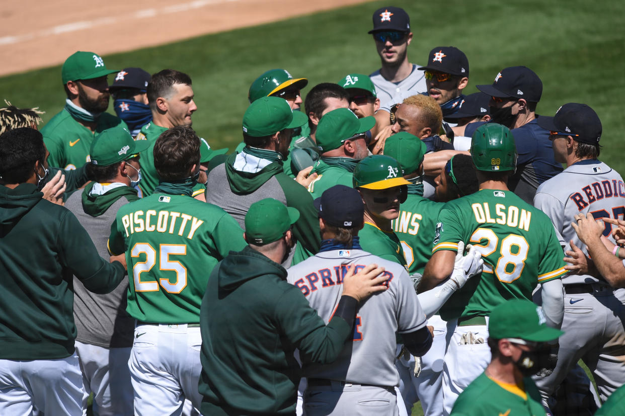 OAKLAND, CA - AUGUST 09: Players and coaches from both sides clash during a benches clearing brawl during the Major League Baseball game between the Houston Astros and the Oakland Athletics on August 9, 2020 at RingCentral Coliseum in Oakland, CA. (Photo by Cody Glenn/Icon Sportswire via Getty Images)
