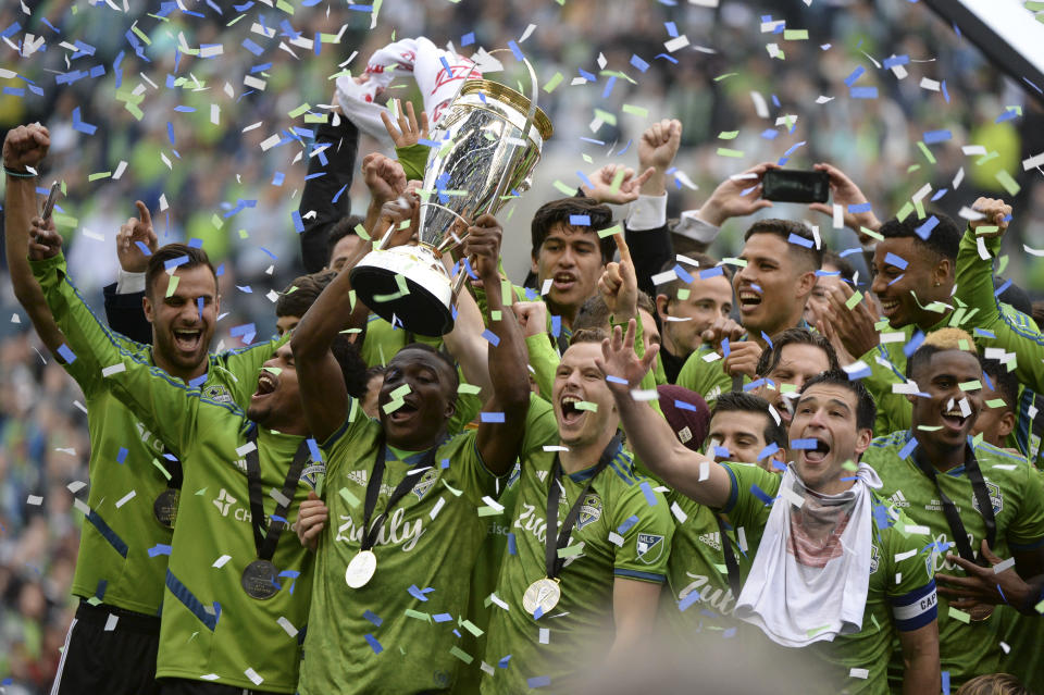 SEATTLE, WA - NOVEMBER 10: The Sounders celebrate on the podium after their 3-1 win over Toronto after the MLS Championship  November 10, 2019, at Century Link Field in Seattle, WA. (Photo by Jeff Halstead/Icon Sportswire via Getty Images)