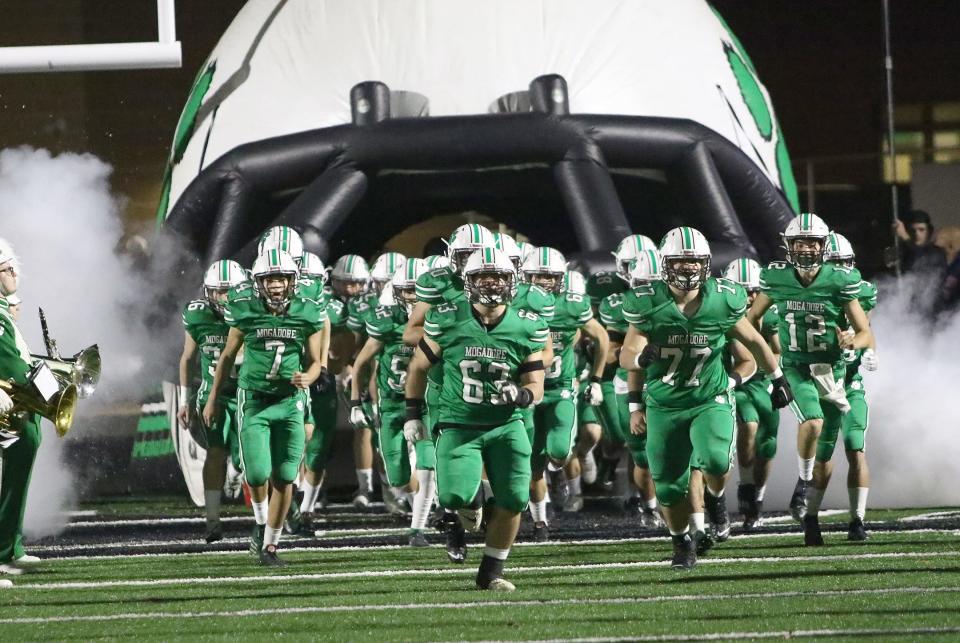 The Mogadore Wildcats take the field before the start of their Week 12 playoff game against Canton Central Catholic Friday, November 4, 2022.