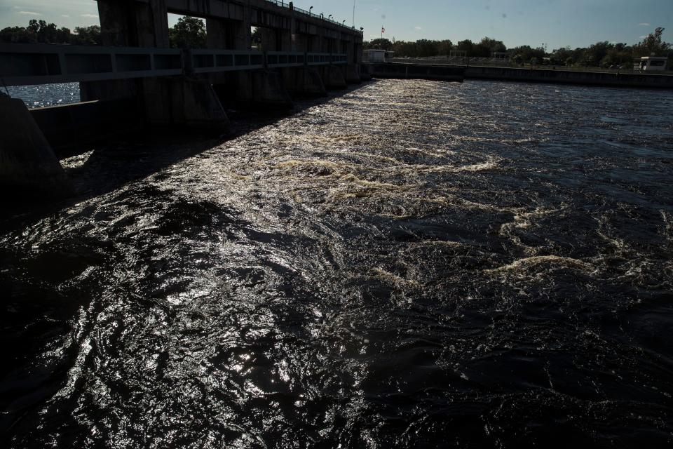 Water pours throught the Franklin Locks on the Caloosahatchee River as Lake Okeechobee discharges continue on Thursday, December 3, 2020. 