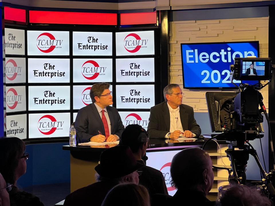 From left, Enterprise reporter Chris Helms and TCAM President Bob Jacobs are panelists at a debate between  Democratic incumbent State Rep. Carol Doherty and her Republican challenger, Taunton City Councilor Chris Coute, on Thursday, Oct. 20, 2022, in the TCAM studio.