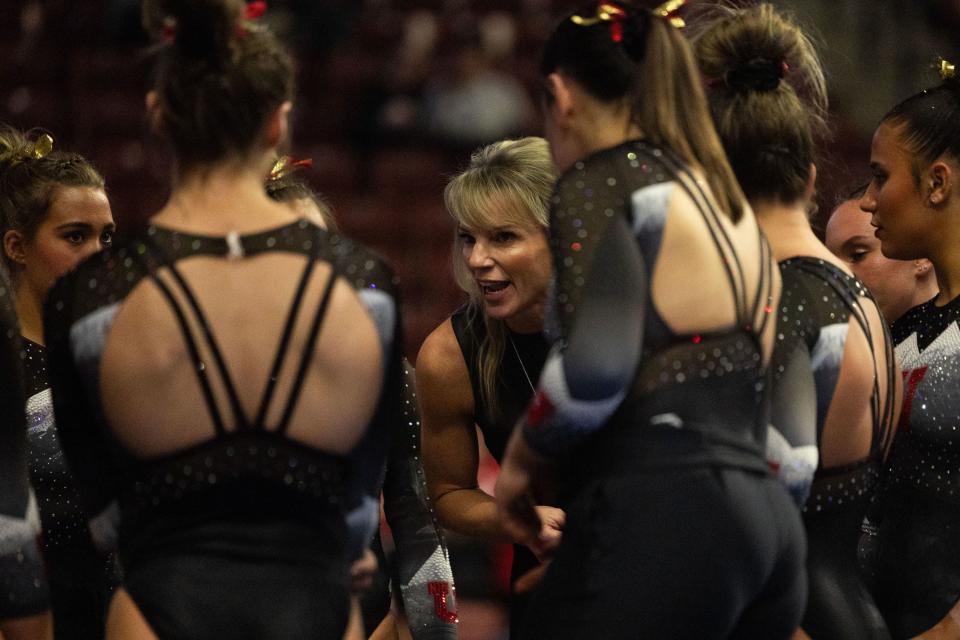 Utah Utes head coach Carly Dockendorf talks to her team during the Sprouts Farmers Market Collegiate Quads at Maverik Center in West Valley on Saturday, Jan. 13, 2024. #1 Oklahoma, #2 Utah, #5 LSU, and #12 UCLA competed in the meet. | Megan Nielsen, Deseret News