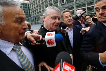 Irish-born Chilean priest John O'Reilly of the Legionaries of Christ conservative Roman Catholic order arrives at a court in Santiago, October 15, 2014. Picture taken October 15, 2014. REUTERS/Ivan Alvarado