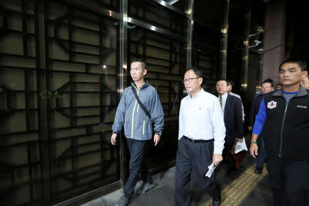 Taiwan's opposition Nationalist Kuomintang Party (KMT) Taipei mayoral candidate Ting Shou-chung arrives at the Taipei district court to file a suit regarding the election result in Taipei, Taiwan November 25, 2018. REUTERS/Ann Wang