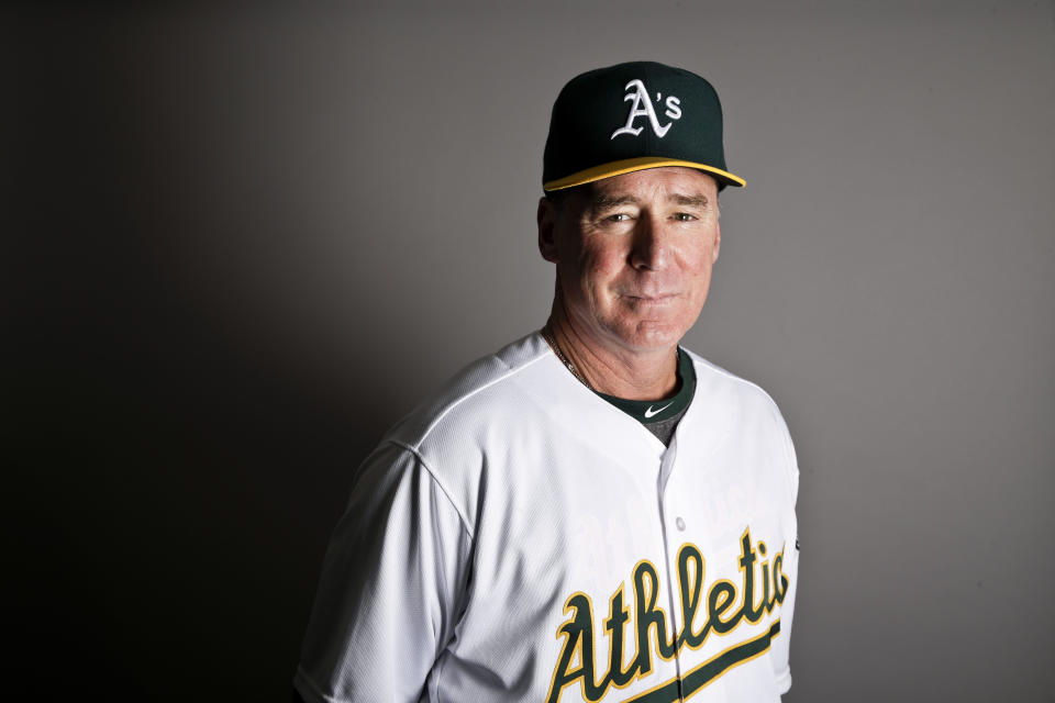 FILE - In this Wednesday, Feb. 22, 2017 file photo, Oakland Athletics manager Bob Melvin poses for a portrait in Mesa, Ariz. Oakland’s Bob Melvin was voted Manager of the Year for the third time, winning the American League honor after leading the Athletics to the playoffs despite the lowest opening-day payroll in the major leagues, Tuesday, Nov. 13, 2018. (AP Photo/Chris Carlson, File)