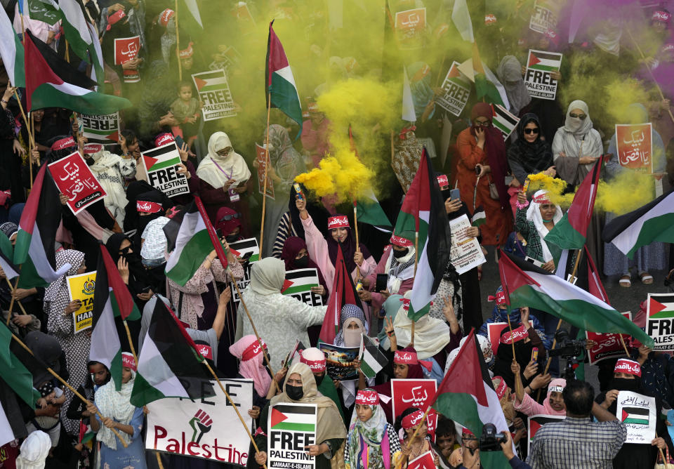 Supporters of the religious and political party Jamaat-e-Islami attend a demonstration against Israeli airstrikes on Gaza, to show solidarity with Palestinian people, in Karachi, Pakistan, Sunday, Oct. 15, 2023. (AP Photo/Fareed Khan)