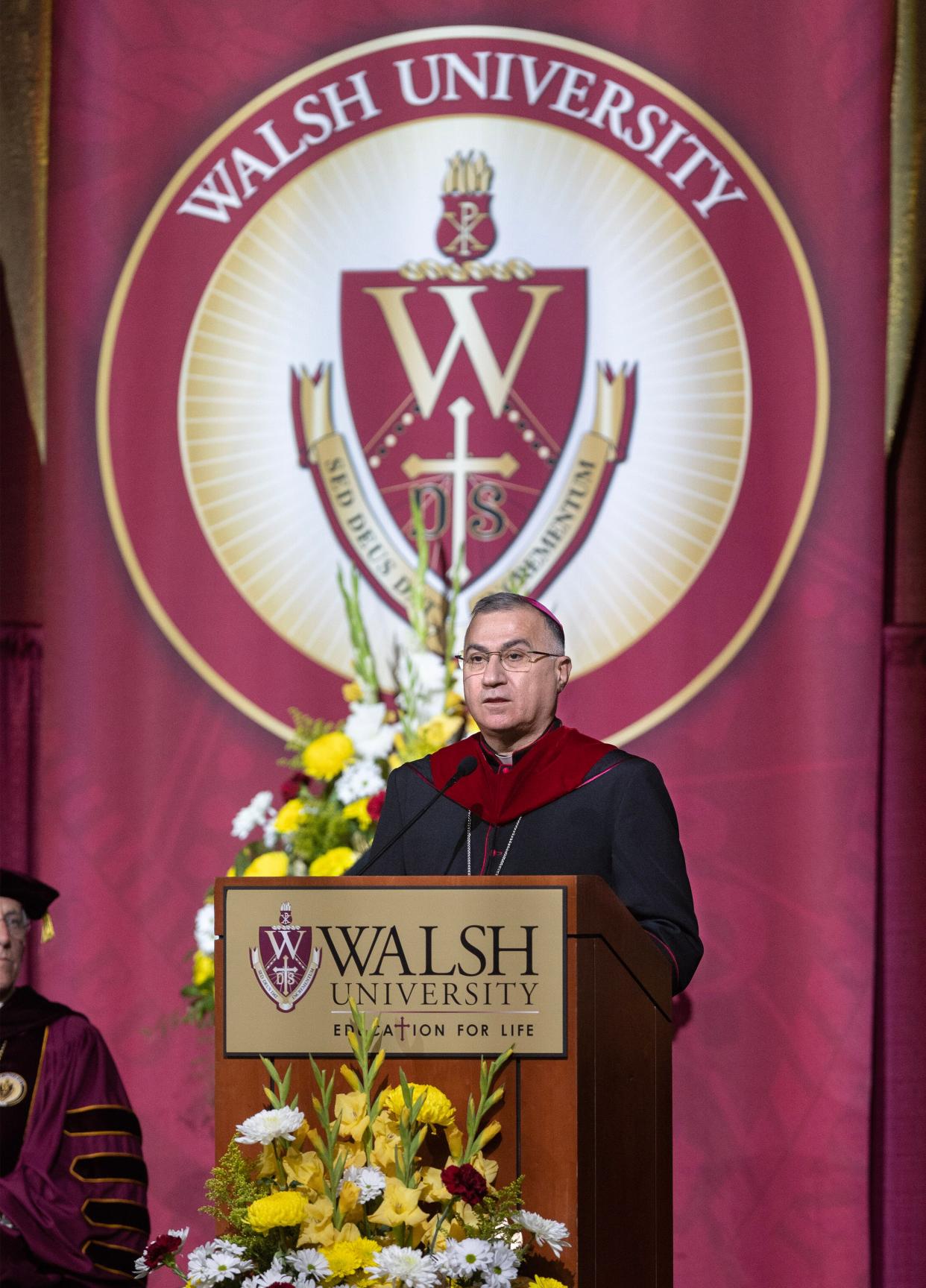 Catholic Archbishop Bashar Matti Warda of Irbil, Iraq, speaks at the Walsh University commencement in North Canton on Saturday.