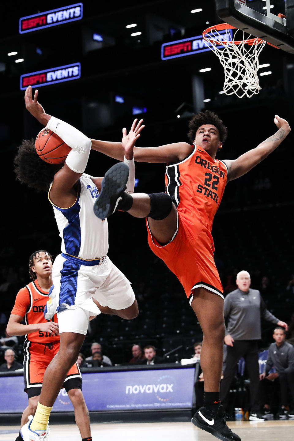 Oregon St forward Thomas Ndong (22) defends against Pittsburgh forward Blake Hinson (2) during the first half of an NCAA college basketball game in the NIT Season Tip-Off, Friday, Nov. 24, 2023, in New York. (AP Photo/Eduardo Munoz Alvarez)