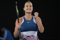 Aryna Sabalenka of Belarus celebrates after defeating Magda Linette of Poland during their semifinal match at the Australian Open tennis championship in Melbourne, Australia, Thursday, Jan. 26, 2023. (AP Photo/Aaron Favila)