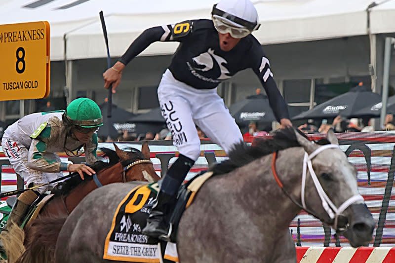 Jockey Jaime Torres celebrates as he crosses the finish line to win the 149th running of the Preakness Stakes at Pimlico Race Course on Saturday in Baltimore. Photo by Mark Abraham/UPI