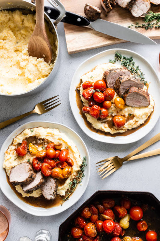 <p>Pass Me Some Tasty</p><p>Tender, juicy, herb-crusted pork tenderloin is served over creamy polenta with roasted garlicky cherry tomatoes. This simple, minimal no-fuss dinner is sure to impress any night of the week and for any special occasion.</p><p><strong>Get the Recipe: </strong><a href="https://www.passmesometasty.com/herb-crusted-pork-tenderloin-with-creamy-polenta/" rel="nofollow noopener" target="_blank" data-ylk="slk:Herb-Crusted Pork Tenderloin with Creamy Polenta;elm:context_link;itc:0;sec:content-canvas" class="link rapid-noclick-resp"><strong>Herb-Crusted Pork Tenderloin with Creamy Polenta</strong></a></p>