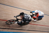 Sam Webster of Team New Zealand, left, and Sebastien Vigier of Team France compete during the track cycling men's sprint at the 2020 Summer Olympics, Thursday, Aug. 5, 2021, in Izu, Japan. (AP Photo/Thibault Camus)