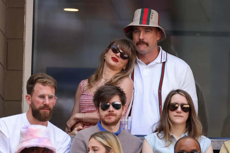 TOPSHOT - US musician Taylor Swift (L) and US NFL football player Travis Kelce (R) attend the men's final match between Italy's Jannik Sinner and USA's Taylor Fritz on day fourteen of the US Open tennis tournament at the USTA Billie Jean King National Tennis Center in New York City, on September 8, 2024. (Photo by CHARLY TRIBALLEAU / AFP) (Photo by CHARLY TRIBALLEAU/AFP via Getty Images)