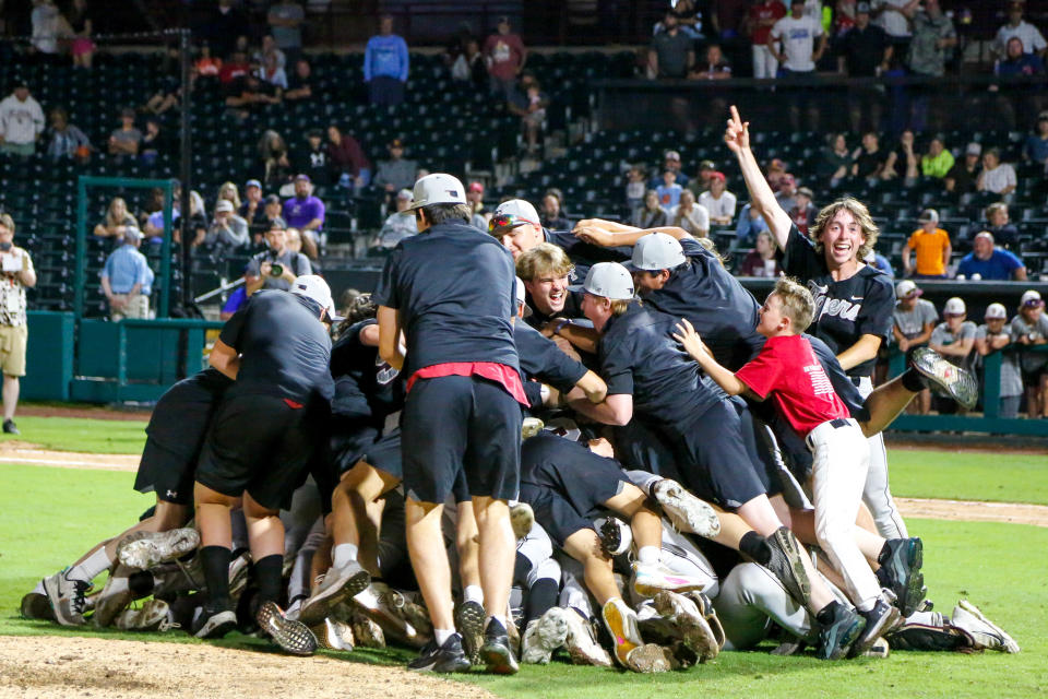 Tuttle celebrates beating Blanchard for the Class 4A state baseball championship last season at Chickasaw Bricktown Ballpark.