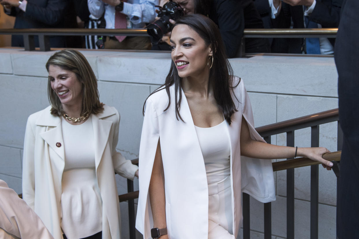 Rep. Alexandria Ocasio-Cortez, D-N.Y., attends a group photo of House Democrats in the Capitol Visitor Center. (Photo: Tom Williams/CQ Roll Call)