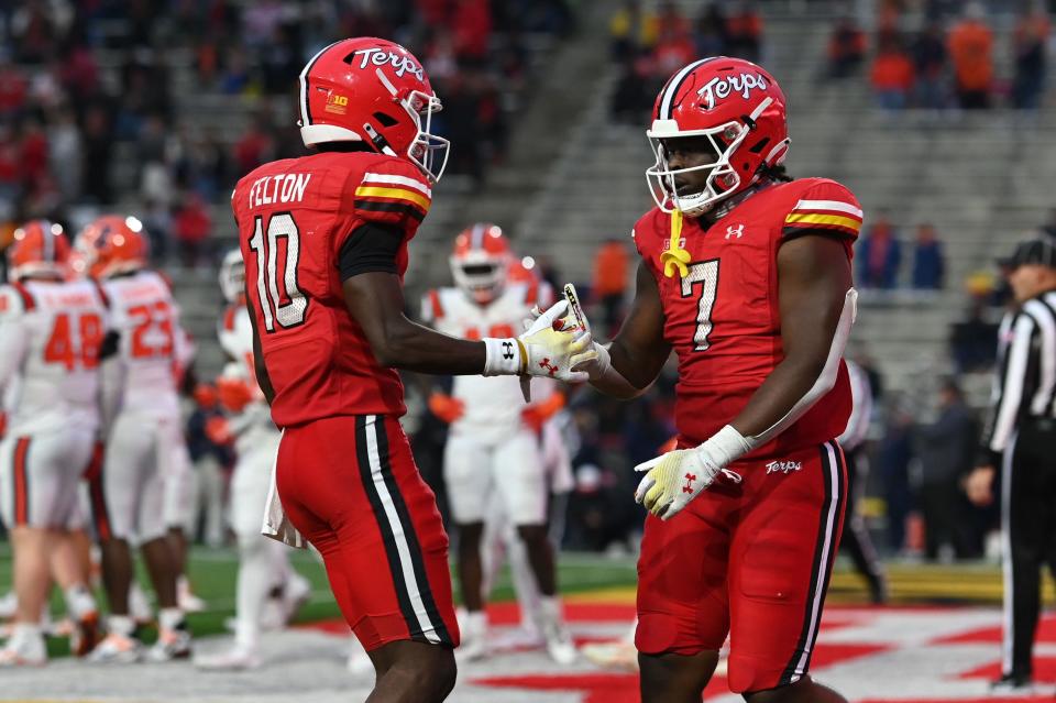 Oct 14, 2023; College Park, Maryland, USA; Maryland Terrapins running back Antwain Littleton II (7) celebrates with wide receiver Tai Felton (10) after scoring a touchdown during the second half at SECU Stadium. Mandatory Credit: Tommy Gilligan-USA TODAY Sports