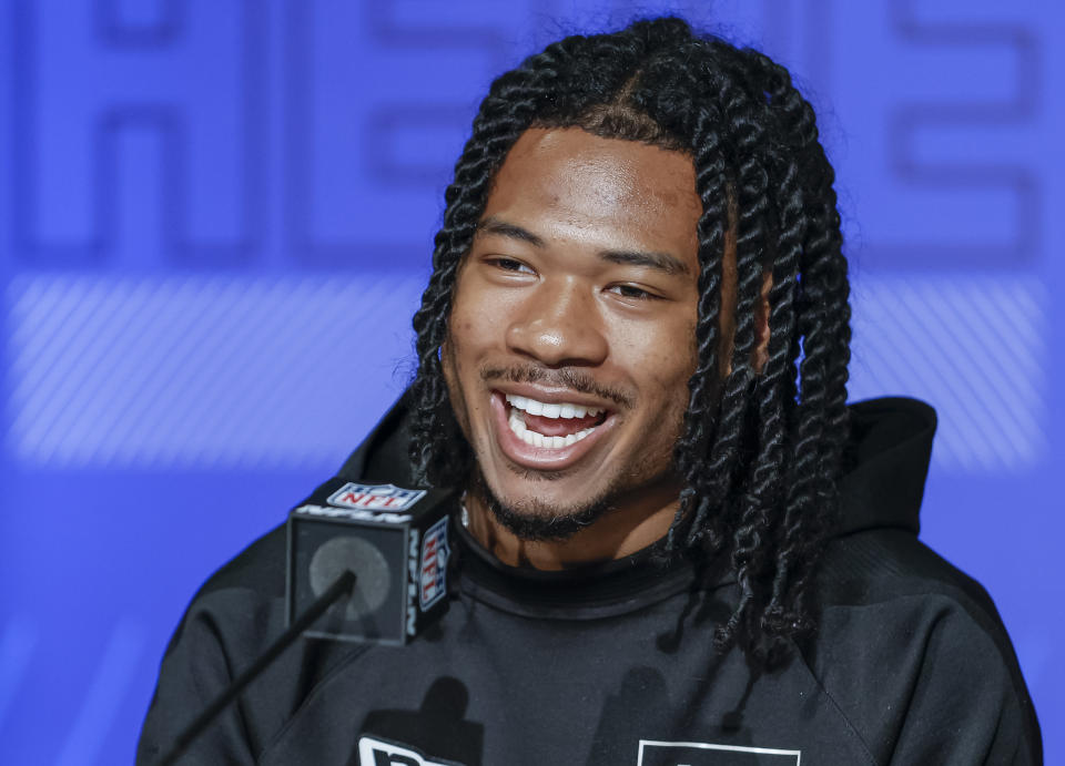 INDIANAPOLIS, IN - MAR 02: John Metchie #WO18 of the Alabama Crimson Tide speaks to reporters during the NFL Draft Combine at the Indiana Convention Center on March 2, 2022 in Indianapolis, Indiana. (Photo by Michael Hickey/Getty Images)