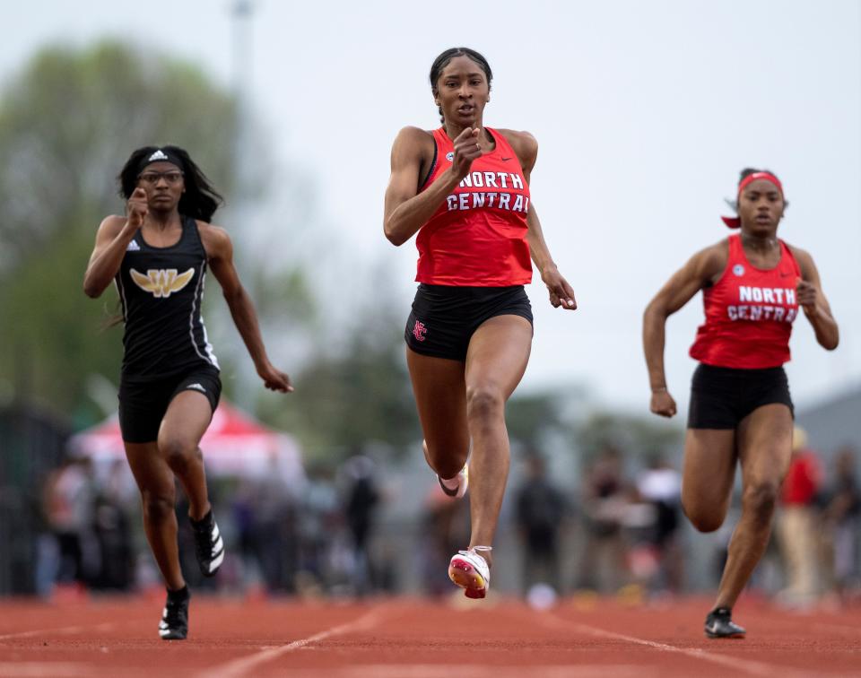 North Central High School senior Ramiah Elliott competes in the girls’ 100M dash during a Metropolitan Interscholastic Conference Track and Field Championship meet, Friday, April 29, 2022, at Pike High School.