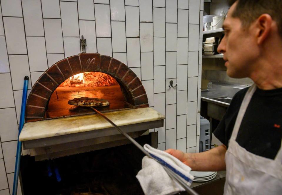 Bobby Masullo, owner of Masullo Pizza, cooks in 2020 at his Land Park restaurant, just off the grid in Sacramento, an example of one of the region’s neighborhood spots that would make a strong Bib Gourmand candidate.