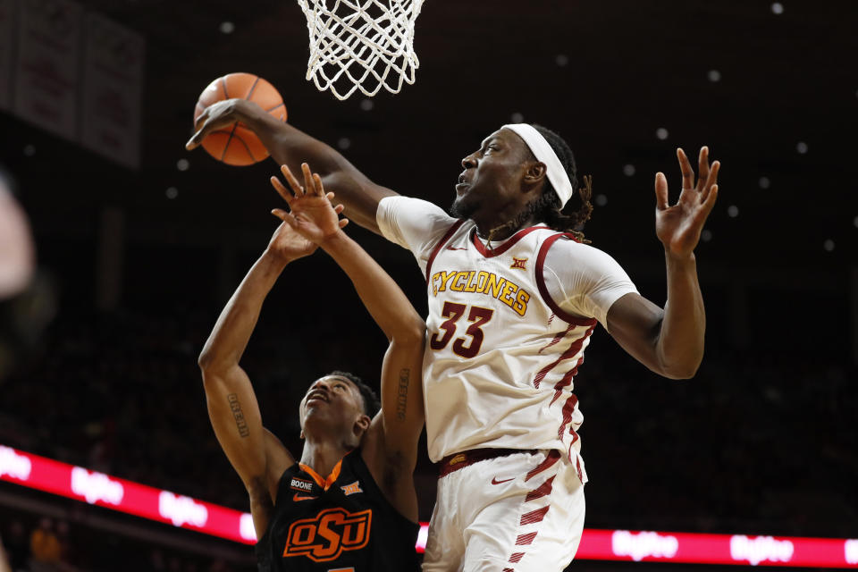 Iowa State forward Solomon Young (33) blocks a shot by Oklahoma State guard Avery Anderson III during the second half of an NCAA college basketball game, Tuesday, Jan. 21, 2020, in Ames, Iowa. Iowa State won 89-82. (AP Photo/Charlie Neibergall)