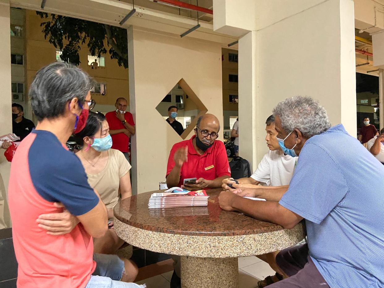 Singapore Democratic Party chairman Paul Tambyah speaking to residents at Blk 254 Bangkit Road on 2 July 2020. (PHOTO: Lauren Ong/Yahoo News Singapore)