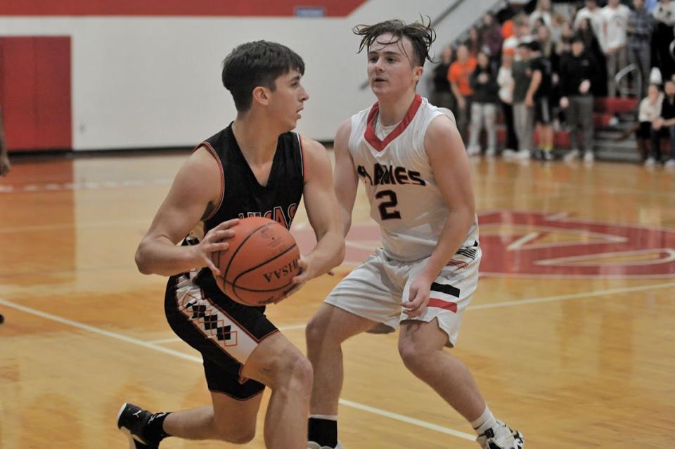 Lucas' Logan Toms and Mansfield Christian's Davis Wushinske.