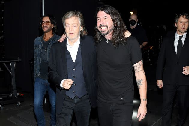 McCartney and Grohl embrace backstage during the ceremony. (Photo: Kevin Mazur via Getty Images)