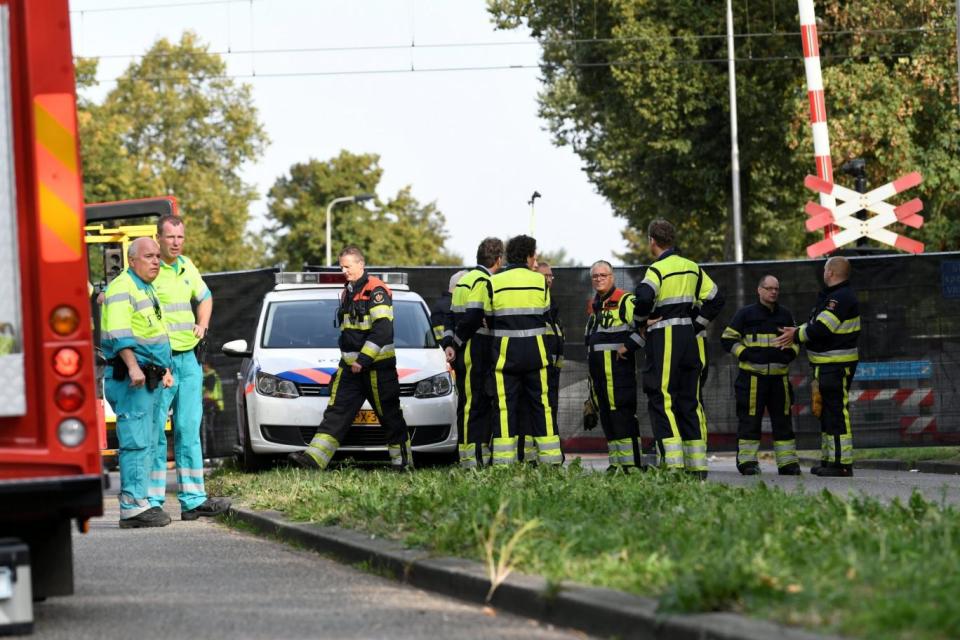 Rescue personnel at the scene where a train struck a cargo bike in Oss (Piroschka van de Wouw/Reuters)