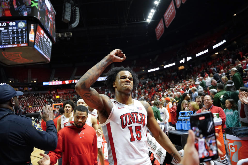 UNLV guard Luis Rodriguez (15) celebrates after defeating Colorado State in an NCAA college basketball game Saturday, Feb. 24, 2024, in Las Vegas. (AP Photo/Lucas Peltier)