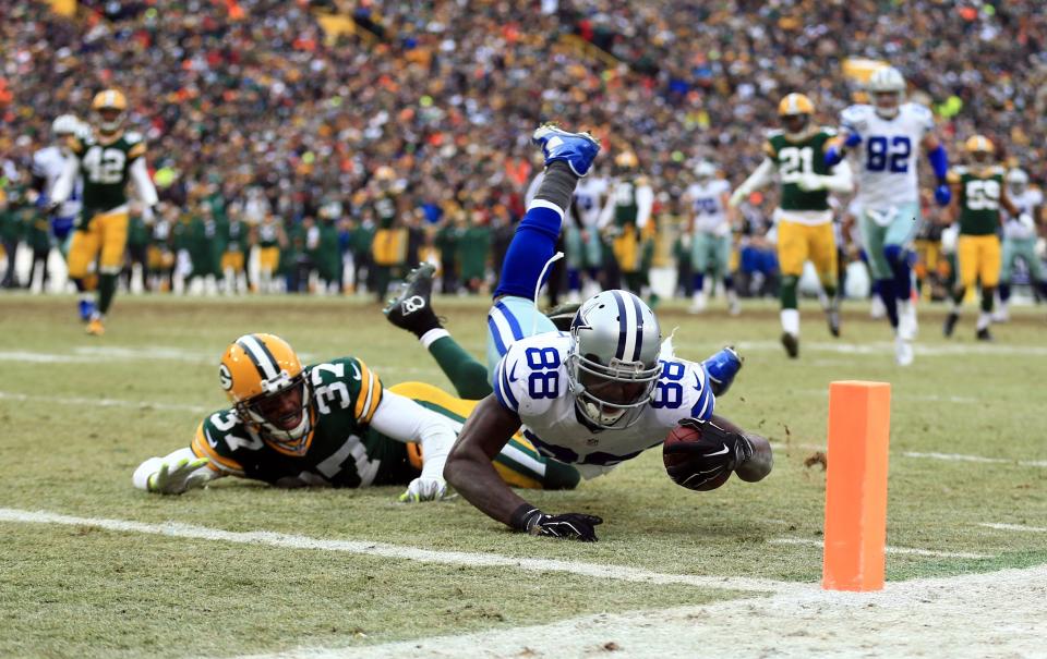 Dallas Cowboys wide receiver Dez Bryant (88) is unable to catch a pass against Green Bay Packers cornerback Sam Shields (37) in the fourth quarter in the 2014 NFC divisional playoff football game at Lambeau Field.