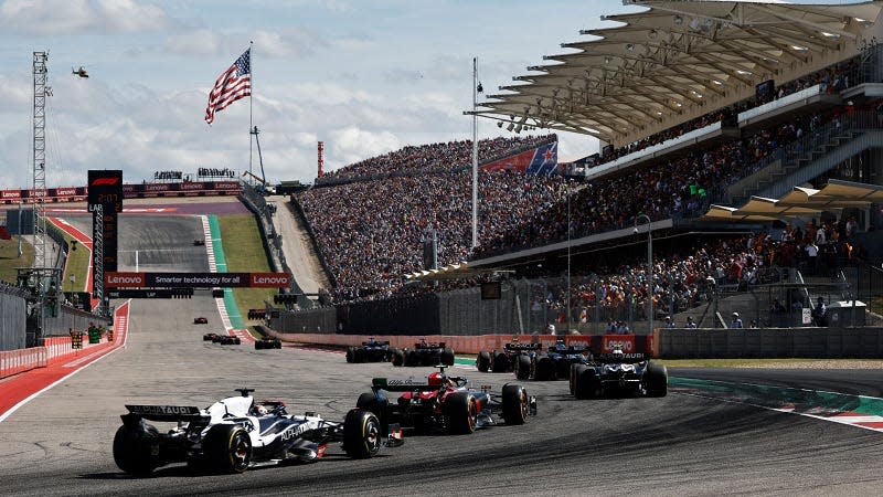 A photo of F1 cars on track at the Circuit Of The Americas. 
