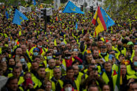 FILE - Truck drivers protest against the high price of fuel in Madrid, Spain, on March 25, 2022. As food costs and fuel bills soar, inflation is plundering people’s wallets, sparking a wave of protests and workers’ strikes around the world. (AP Photo/Manu Fernandez)