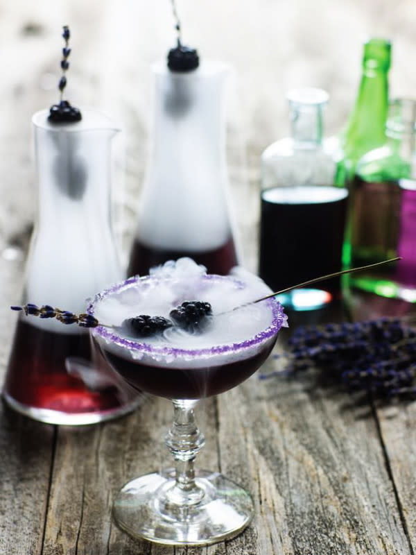 <p>HoliCoffee</p><p>If you want to add a spooky vibe to your Halloween cocktails, dry ice will do the trick. Find out how to add it safely and get the whole recipe over at <a href="http://holicoffee.com/black-witch-cocktail-best-cheap-halloween-holiday-party-food-drink-menu-idea/" rel="nofollow noopener" target="_blank" data-ylk="slk:HoliCoffee;elm:context_link;itc:0;sec:content-canvas" class="link ">HoliCoffee</a>.</p>